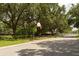 Outdoor basketball court surrounded by trees at 3211 Gold Ln, Kissimmee, FL 34747