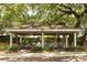 Covered outdoor kitchen and dining area at 3211 Gold Ln, Kissimmee, FL 34747