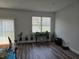 Living room with hardwood floors and neutral walls at 120 Zinnia W Ln, Kissimmee, FL 34759