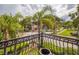 View from balcony features a tree-lined street and neighborhood homes at 503 N Summerlin Ave, Orlando, FL 32803