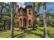 Inviting exterior of a unique home with a circular design and balcony at 503 N Summerlin Ave, Orlando, FL 32803