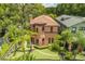 An aerial view of a beautiful home with a unique architectural style at 503 N Summerlin Ave, Orlando, FL 32803