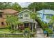 Aerial view of charming two-story home with landscaped yard at 503 N Summerlin Ave, Orlando, FL 32803