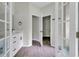 Elegant bathroom with white vanities, double sinks, and tile flooring at 556 Marion Oaks Pass, Ocala, FL 34473