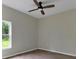 Bright bedroom with window and ceiling fan at 556 Marion Oaks Pass, Ocala, FL 34473