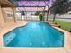 Inviting screened-in pool area with a relaxing atmosphere at 11932 Old Glory Dr, Orlando, FL 32837