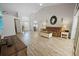 Bright and airy living room with hardwood floors and plenty of natural light at 4423 Nottoway Dr, Leesburg, FL 34748