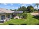 Backyard oasis with a private pool and screened enclosure at 4423 Nottoway Dr, Leesburg, FL 34748
