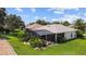 Single-Gathering home with a private pool and lush landscaping at 4423 Nottoway Dr, Leesburg, FL 34748
