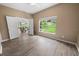 Spacious bedroom with window overlooking the backyard at 4423 Nottoway Dr, Leesburg, FL 34748