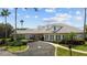 Charming community clubhouse with ample parking at 4423 Nottoway Dr, Leesburg, FL 34748
