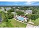 Aerial view of community pool and clubhouse at 4423 Nottoway Dr, Leesburg, FL 34748