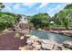 Relaxing waterfall and pond landscape at 4423 Nottoway Dr, Leesburg, FL 34748