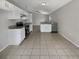Modern kitchen with granite countertops and stainless steel appliances at 6516 Viewpoint Ct, Orlando, FL 32810