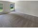 Well-lit bedroom with carpeted floor and ample space at 6516 Viewpoint Ct, Orlando, FL 32810