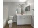 Bathroom with vanity, toilet and mirror at 6516 Viewpoint Ct, Orlando, FL 32810