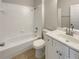 Clean bathroom with a shower/tub combo, toilet and vanity at 6516 Viewpoint Ct, Orlando, FL 32810