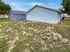 View of the home's backyard with light-blue and purple houses at 6516 Viewpoint Ct, Orlando, FL 32810