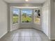 Dining area with a bay window offering a view of the street at 6516 Viewpoint Ct, Orlando, FL 32810