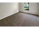 Spacious bedroom with carpet and a window offering natural light at 6516 Viewpoint Ct, Orlando, FL 32810