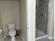 Small bathroom with a toilet and shower at 3141 Paradox Cir # 306, Kissimmee, FL 34746
