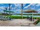 Seating area by the pool with a view of the lake at 3141 Paradox Cir # 306, Kissimmee, FL 34746
