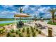 Relaxing pool area with lounge chairs and waterfront views at 3141 Paradox Cir # 306, Kissimmee, FL 34746