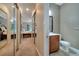 Guest bathroom with toilet and sink, located conveniently near bedrooms at 12203 Pasha Ln, Orlando, FL 32827