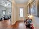 Bright entryway with hardwood floors and elegant decor at 12203 Pasha Ln, Orlando, FL 32827