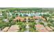 Community clubhouse with pool and clock tower at 12203 Pasha Ln, Orlando, FL 32827