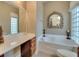 Elegant bathroom with soaking tub and double vanity at 12203 Pasha Ln, Orlando, FL 32827