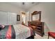 Bedroom with a queen-size bed and ensuite bathroom access at 12203 Pasha Ln, Orlando, FL 32827