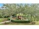 playground nestled under shady trees at 12203 Pasha Ln, Orlando, FL 32827