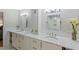 Updated bathroom, featuring double vanity and marble countertops at 1055 Kensington Park Dr # 212, Altamonte Springs, FL 32714