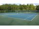 Two well-maintained tennis courts with surrounding fencing at 2652 Carrickton Cir, Orlando, FL 32824