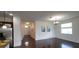 Bright dining room with hardwood floors and chandelier at 2652 Carrickton Cir, Orlando, FL 32824