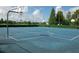 Community basketball court with multiple hoops and painted lines at 2652 Carrickton Cir, Orlando, FL 32824