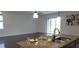 Kitchen island with sink and breakfast bar overlooking the living room at 2652 Carrickton Cir, Orlando, FL 32824