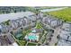 Apartment complex with pool, tennis court, and parking at 7573 Laureate Blvd # 1301, Orlando, FL 32827