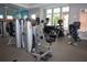 Modern gym with various strength and cardio equipment at 7574 Sunny Dreams Ln, Kissimmee, FL 34747