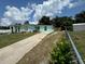 Light teal single-story house exterior at 812 Lily Ct, Deltona, FL 32725
