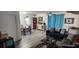 Living room with dining area and comfy sofa at 812 Lily Ct, Deltona, FL 32725