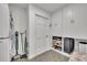 Bright laundry room with washer, dryer, and storage at 137 Variety Tree Cir, Altamonte Springs, FL 32714