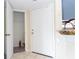Hallway view of an apartment with a coat closet and door at 1932 Lake Atriums Cir # 86, Orlando, FL 32839