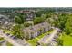Apartment complex with a lake and ample parking at 1932 Lake Atriums Cir # 86, Orlando, FL 32839