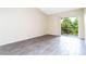 Bright living room with sliding glass doors to balcony at 1932 Lake Atriums Cir # 86, Orlando, FL 32839