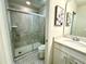 Bathroom with shower and single vanity at 8911 Zurich Ln, Kissimmee, FL 34747