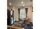 Kitchen with breakfast nook and hardwood floors at 1908 Piedmont Ct, Mascotte, FL 34753