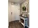 Front entry with console table and decor at 1908 Piedmont Ct, Mascotte, FL 34753