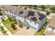 House with solar panels, two-car garage, and a large backyard at 8324 Ludington Cir, Orlando, FL 32836